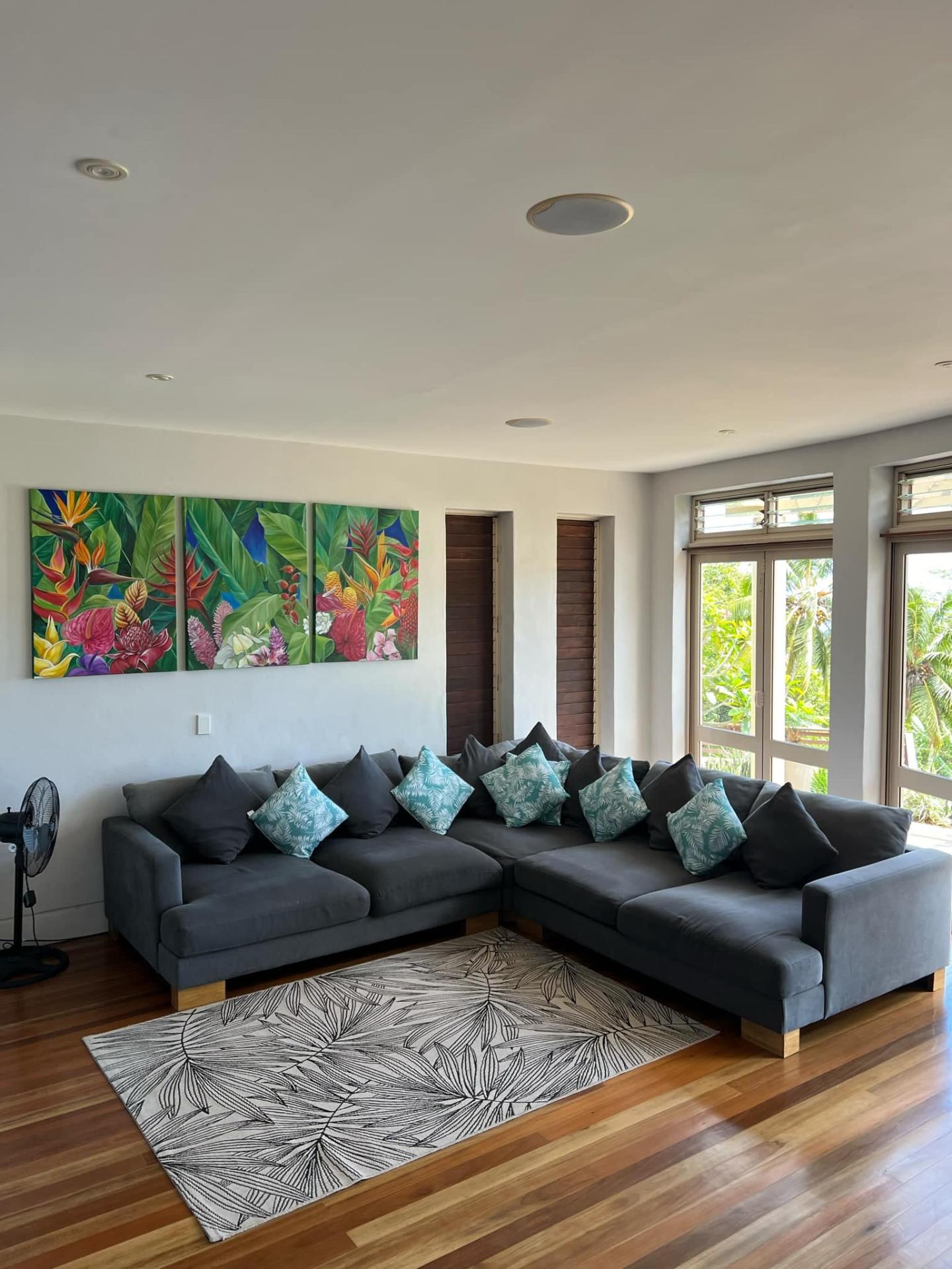 Iro Retreat lounge with tropical art