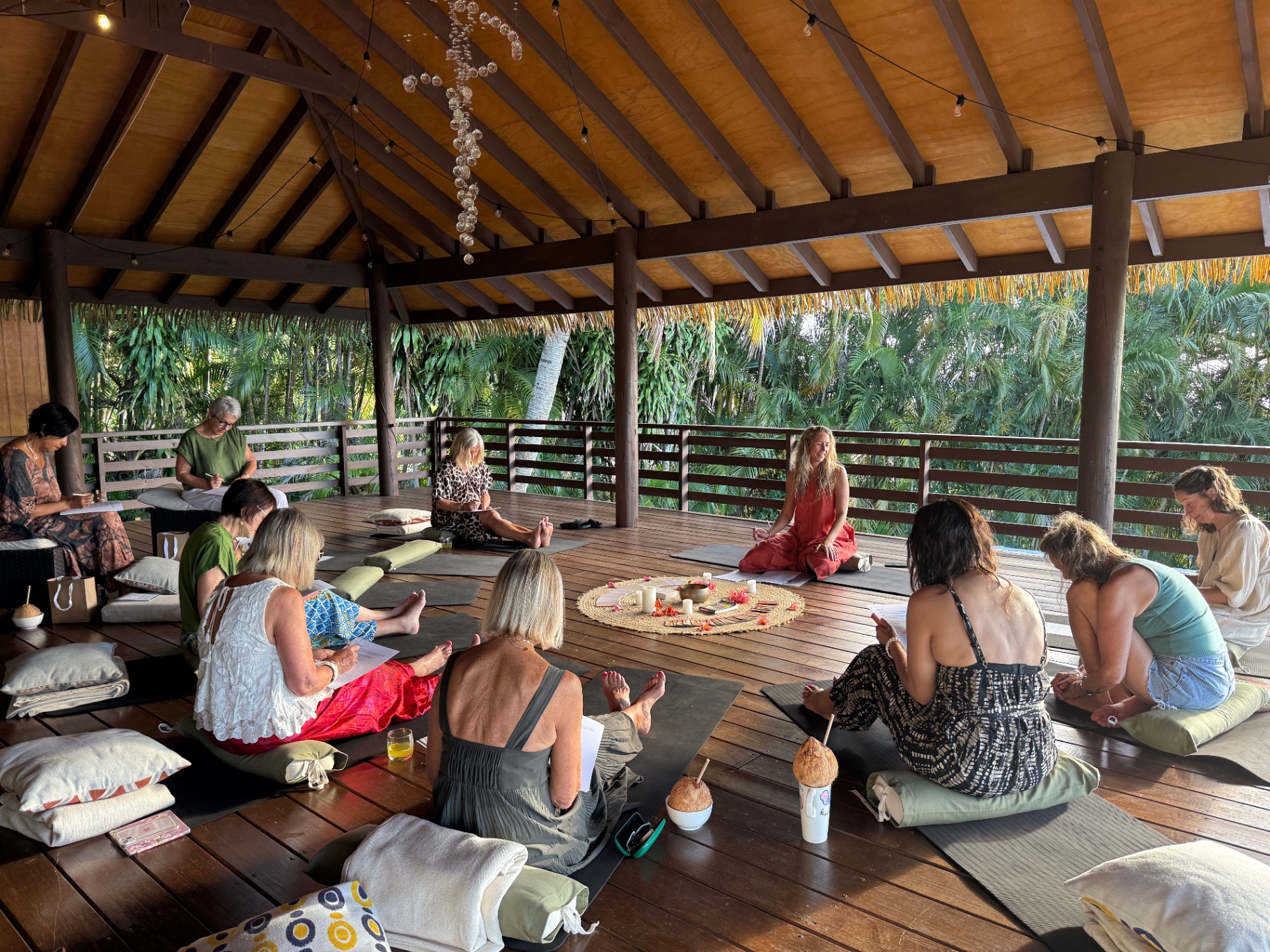 Group meditation circle at the retreat pavilion